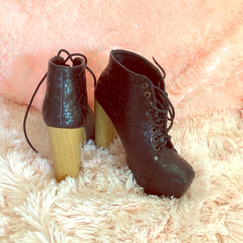 Woven black booties with wood like heels